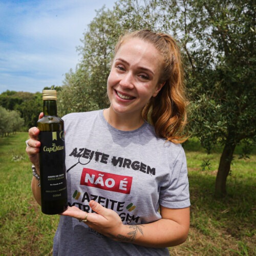 Carolina Capoani from Capolivo holds olive oil