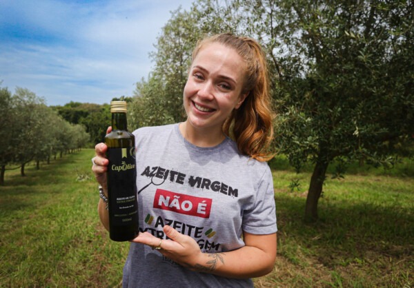 Carolina Capoani from Capolivo holds olive oil